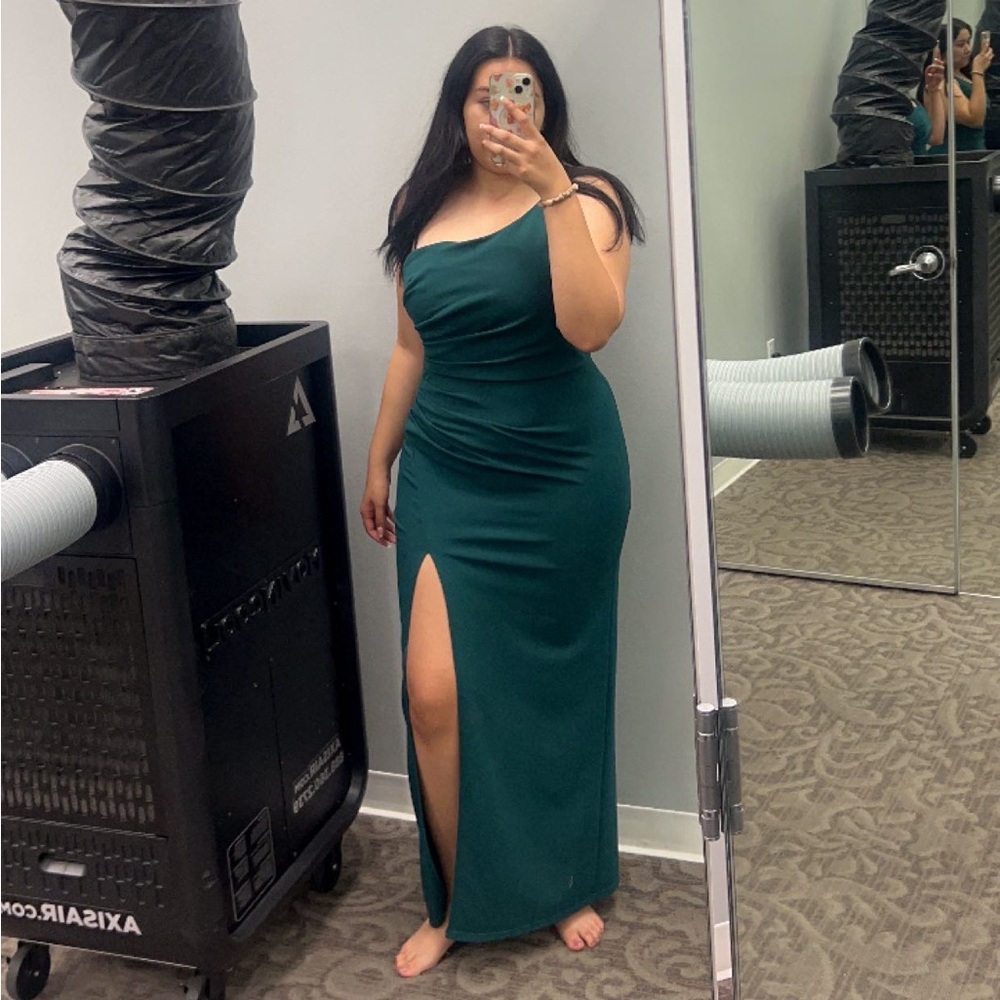 Green special occasion dress

Brand: celebrate db studio 
Polyester/spandex mix